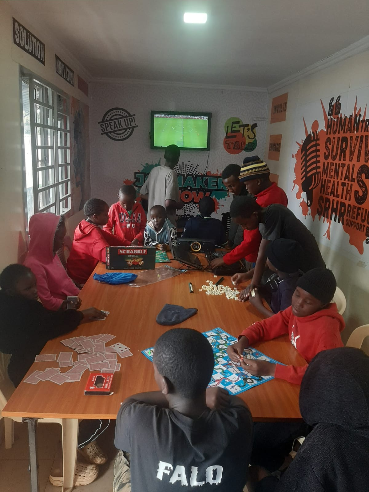 Youth playing games at Safe Spaces Hub